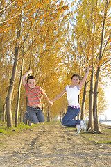 Image showing Happy active children jumping