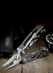 Image showing stainless steel multitool isolated