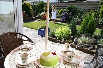 Image showing Laid coffee table with Princess gateau