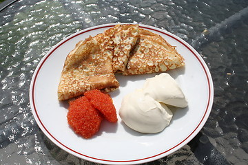 Image showing Crepes with caviar and creme fraiche