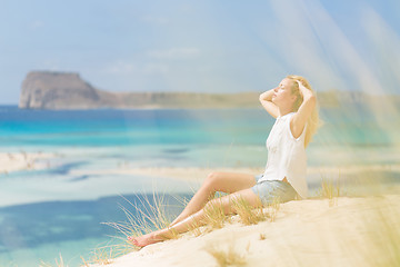 Image showing Relaxed Happy Woman Enjoying Sun on Vacations.