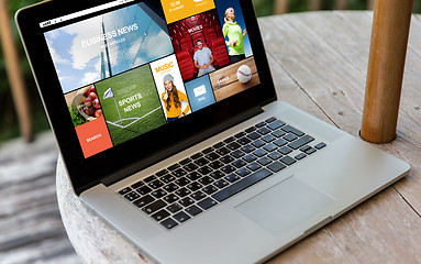 Image showing close up of laptop computer on table at hotel