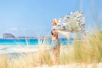 Image showing Free Happy Woman Enjoying Sun on Vacations.