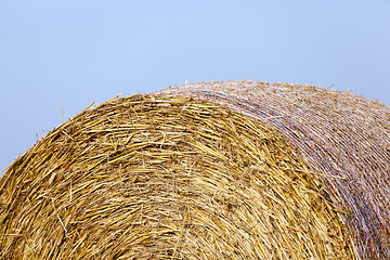 Image showing stack of straw in the field  