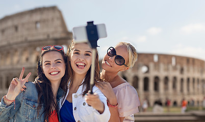 Image showing group of smiling women taking selfie in rome