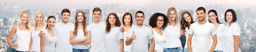 Image showing group of happy different people in white t-shirts