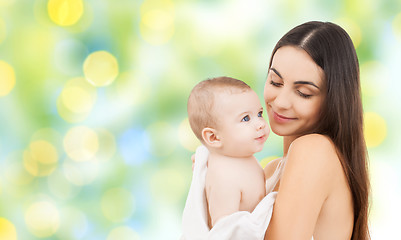 Image showing happy mother holding adorable baby