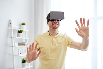 Image showing young man in virtual reality headset or 3d glasses