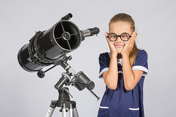 Image showing The young astronomer funny glasses made a face