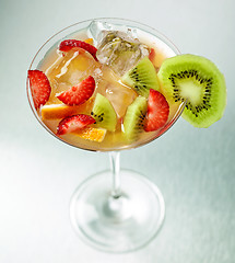 Image showing fresh iced cocktail with fruits