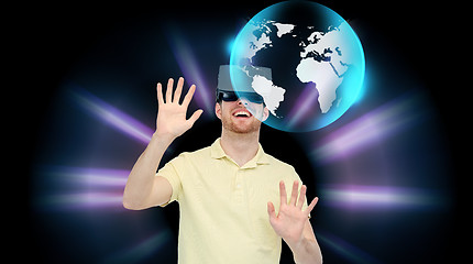 Image showing happy man in virtual reality headset or 3d glasses