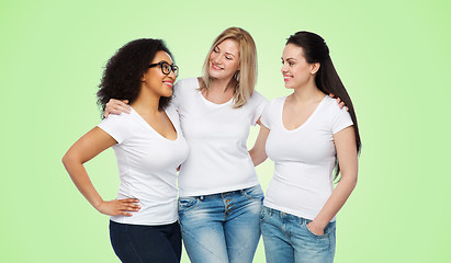 Image showing group of happy different women in white t-shirts