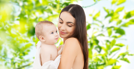 Image showing happy mother holding adorable baby