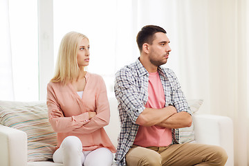 Image showing unhappy couple having argument at home