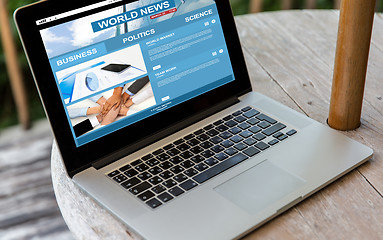 Image showing close up of laptop computer on table at hotel