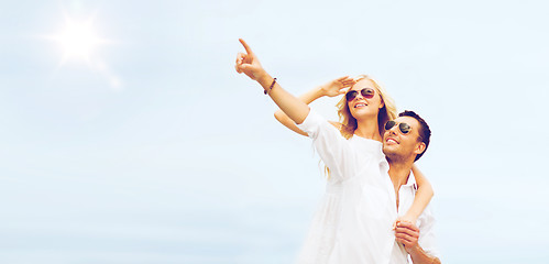 Image showing couple in shades at sea side