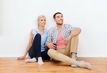 Image showing couple with cardboard boxes moving to new home