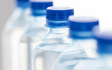 Image showing close up of plastic bottles with drinking water