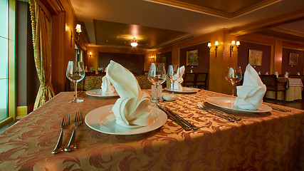 Image showing Empty wine glasses set in restaurant