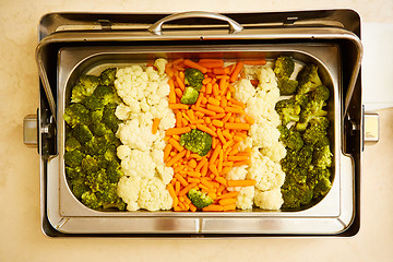 Image showing steamed vegetables in a dining room at breakfast in the hotel