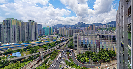 Image showing hong kong public estate buildings with landmark lion rock