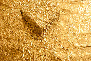 Image showing Gold foil figures