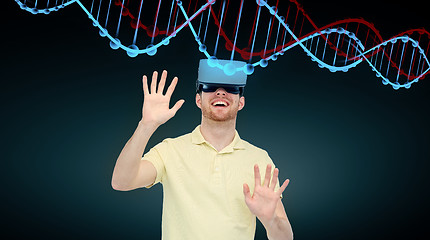 Image showing happy man in virtual reality headset or 3d glasses