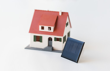 Image showing close up of house model and solar battery or cell