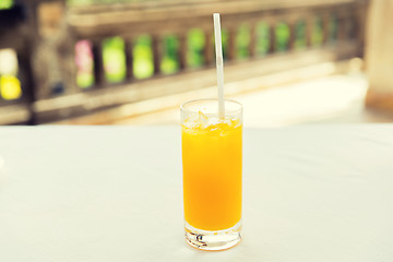 Image showing glass of fresh orange fruit juice at restaurant