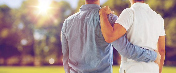 Image showing close up of happy male gay couple hugging