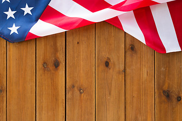 Image showing close up of american flag on wooden boards