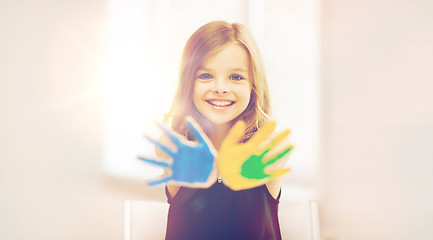 Image showing girl showing painted hands