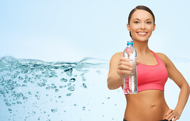 Image showing sporty woman with bottle of water