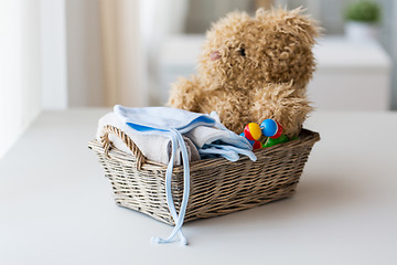 Image showing close up of baby clothes and toys for newborn