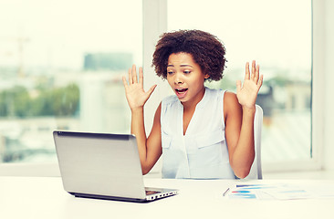 Image showing african woman with laptop at office
