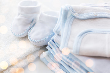 Image showing close up of baby boys clothes for newborn on table