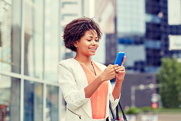 Image showing happy african businesswoman with smartphone