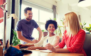 Image showing happy creative team in office