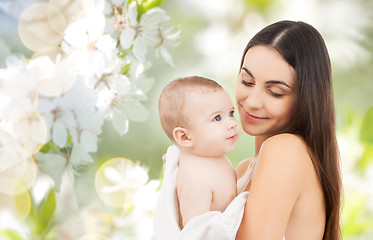 Image showing happy mother holding adorable baby