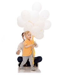 Image showing happy father and son with bunch of balloons