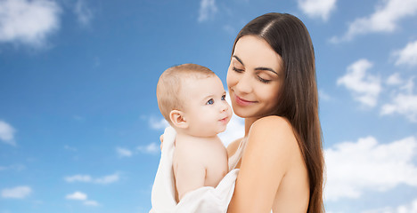 Image showing happy mother holding adorable baby