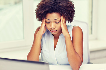 Image showing african woman with laptop at office