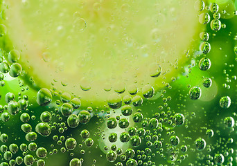 Image showing lemon in sparcle water drops