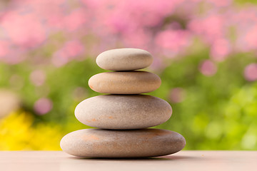 Image showing balancing pebble zen stones outdoor