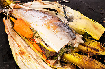 Image showing Baked mackerel with vegetables and herbs