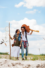 Image showing Man and woman as boho hipsters against blue sky