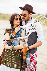 Image showing Man and woman as boho hipsters against blue sky