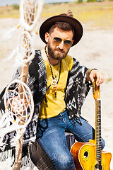 Image showing Man as boho hipster against blue sky