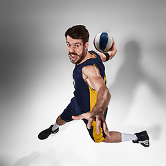 Image showing Full length portrait of a basketball player with ball