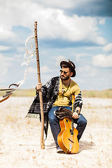 Image showing Man as boho hipster against blue sky